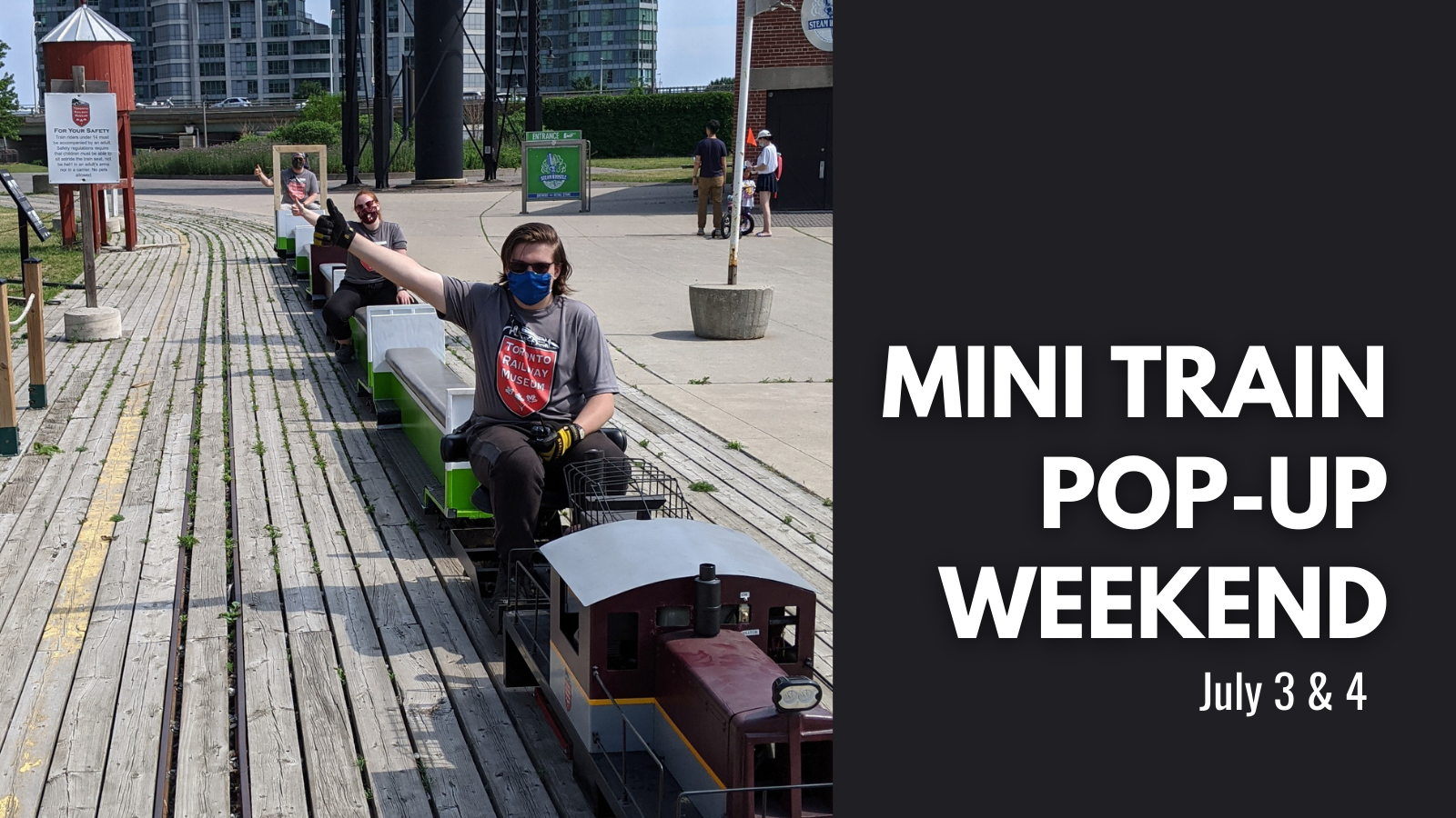 Musuem staff members prepare the miniature train for the july pop up event