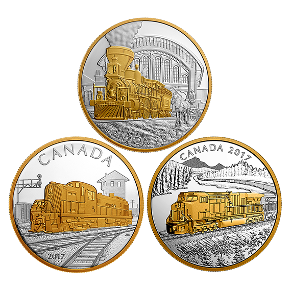 Three gold and silver coins with different locomotives on them