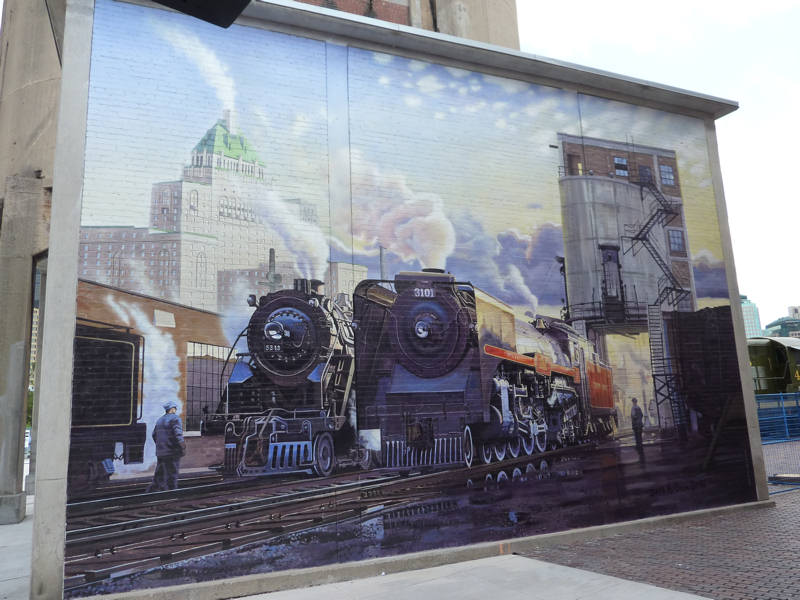 Completed mural of two steam locomotives 