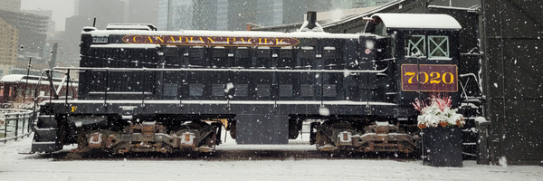 Snowy diesel locomotive outdoors at the museum